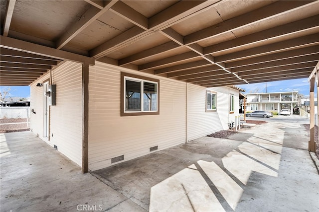 view of property exterior featuring a patio area