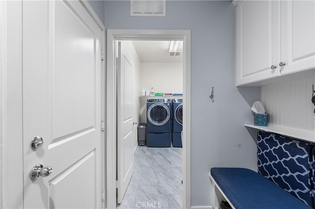 laundry room with washer and clothes dryer