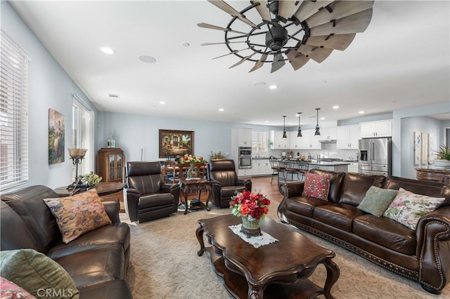 living room with ceiling fan