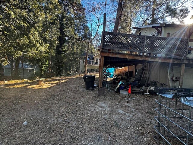 view of yard featuring a deck