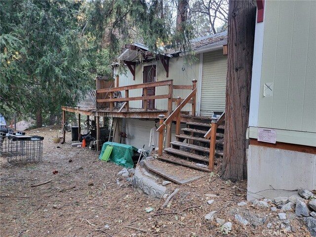 back of house with a garage