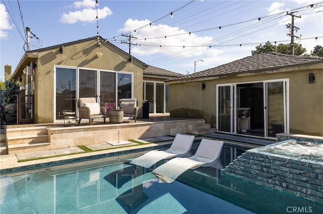 back of house featuring a patio area