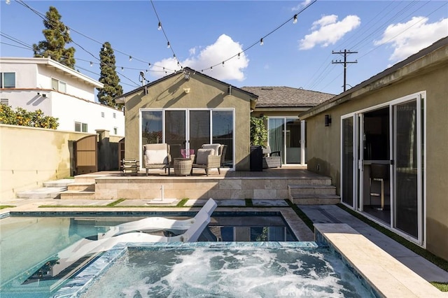 back of house featuring a patio