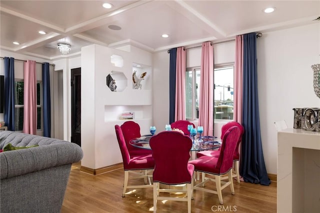 dining room featuring coffered ceiling, hardwood / wood-style floors, and beam ceiling