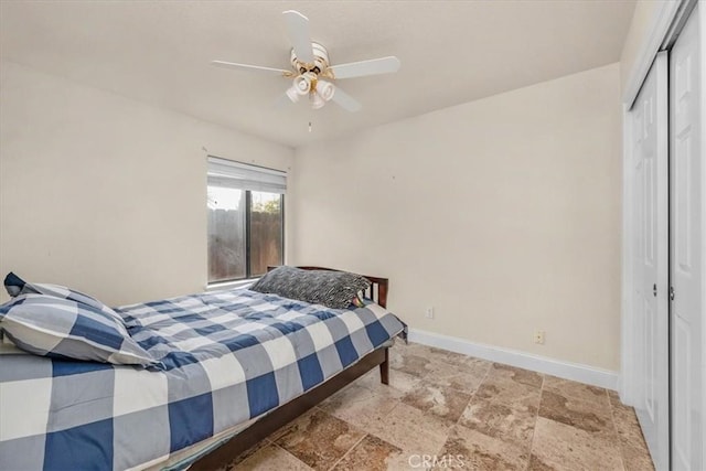 bedroom featuring a closet and ceiling fan