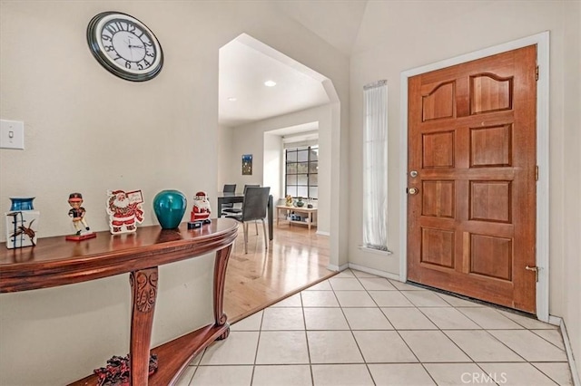 entrance foyer featuring light tile patterned flooring