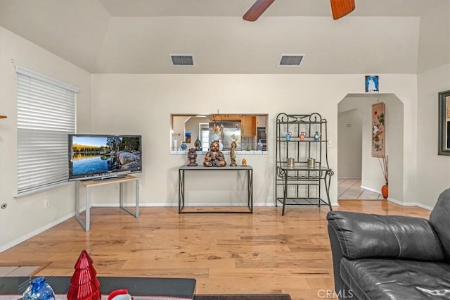 living room featuring ceiling fan and wood-type flooring