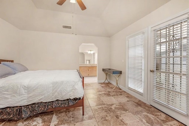 bedroom with ceiling fan, lofted ceiling, and multiple windows