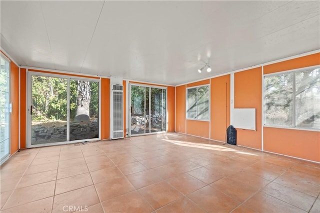 interior space featuring light tile patterned floors