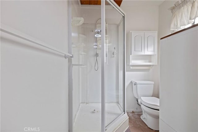 bathroom with toilet and walk in shower