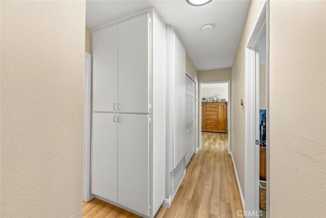 hall featuring light wood-type flooring