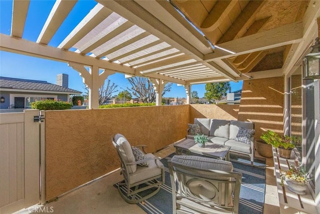 view of patio / terrace featuring a pergola and an outdoor hangout area