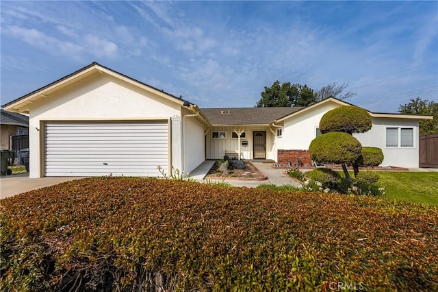 ranch-style house featuring a garage