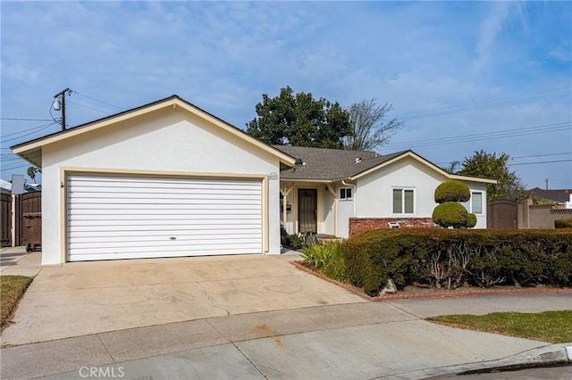 single story home featuring a garage