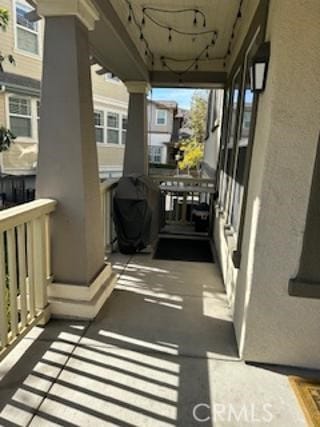 balcony featuring area for grilling