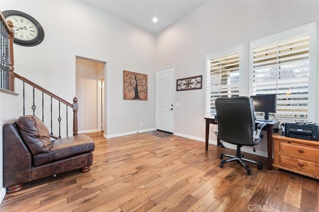 22 Arlington St, Ladera Ranch, CA 92694 - office space featuring wood finished floors, a high ceiling, baseboards, and recessed lighting
