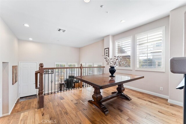 interior space featuring recessed lighting, baseboards, visible vents, and light wood-type flooring