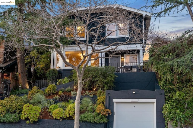 view of front of property featuring a garage