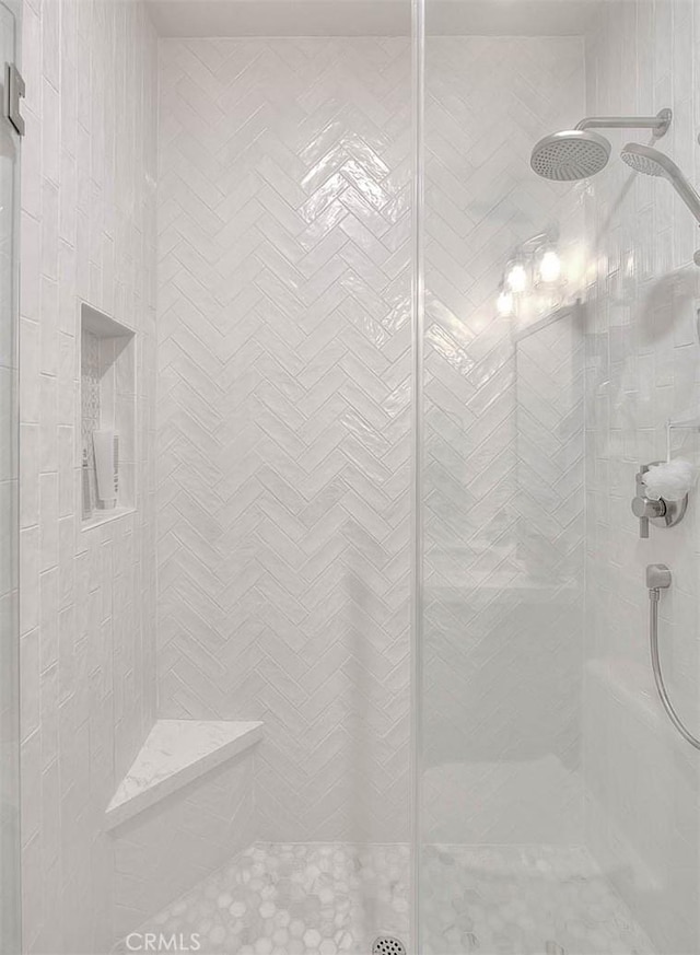 details with a tile shower