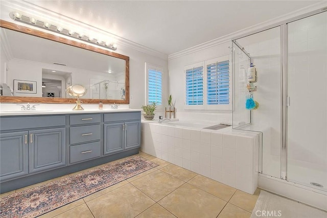 bathroom featuring crown molding, tile patterned floors, and vanity