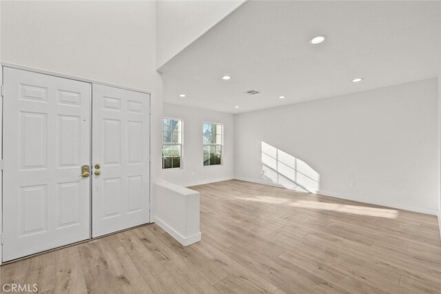 entryway with light wood-type flooring