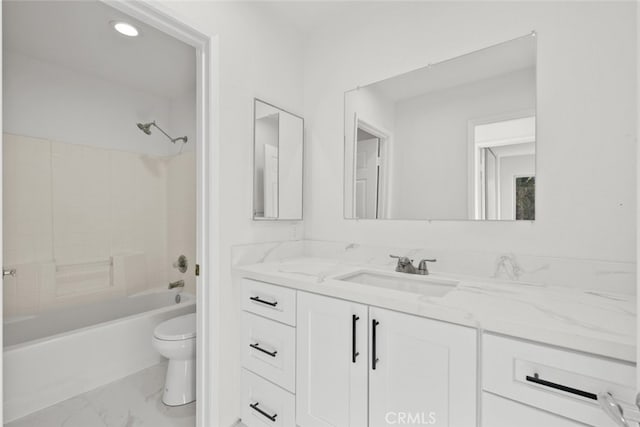 full bathroom featuring vanity, shower / washtub combination, and toilet