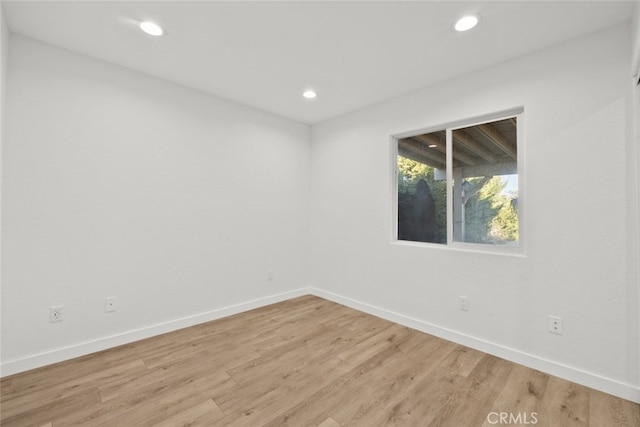 empty room featuring light hardwood / wood-style floors