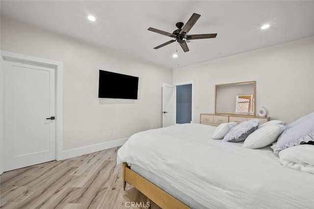 bedroom featuring ceiling fan and light wood-type flooring