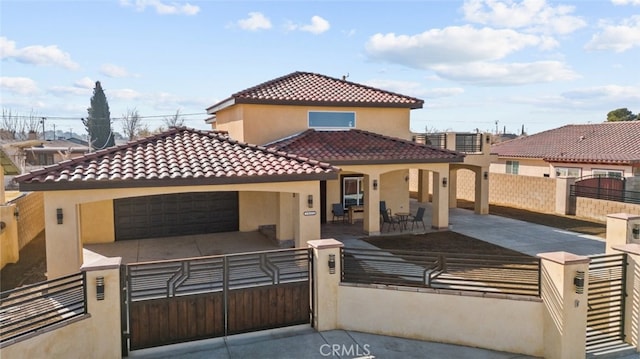 mediterranean / spanish-style house featuring a garage