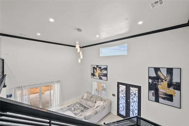 interior space featuring crown molding and french doors