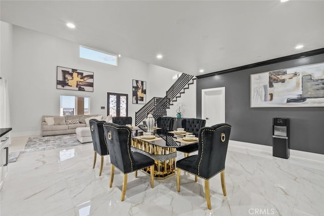 dining room featuring ornamental molding