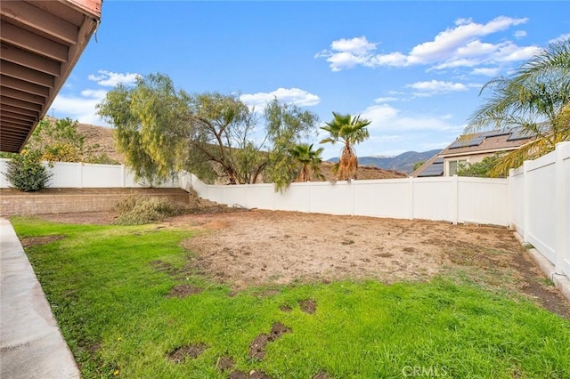 view of yard with a mountain view