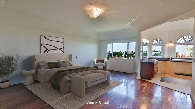 bedroom featuring dark wood-type flooring and sink