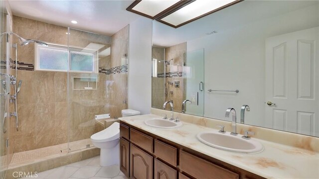 bathroom with vanity, an enclosed shower, tile patterned floors, and toilet