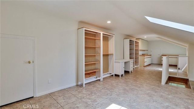 bonus room featuring vaulted ceiling with skylight, baseboards, and recessed lighting