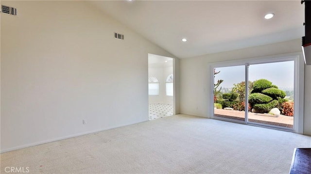 carpeted spare room featuring high vaulted ceiling, recessed lighting, and visible vents