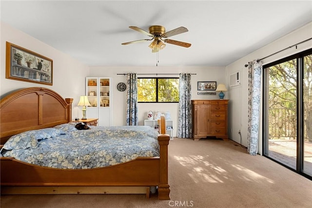 bedroom featuring ceiling fan, carpet, and access to outside