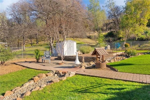 exterior space with a yard and a shed