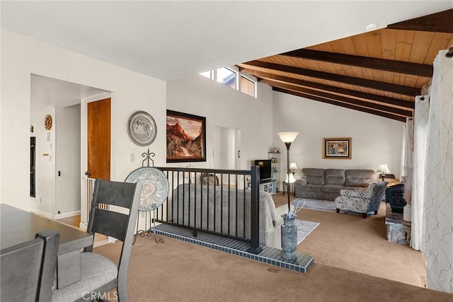 living room featuring wood ceiling, carpet flooring, and lofted ceiling with beams