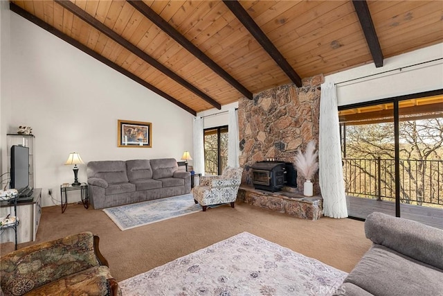 carpeted living room with high vaulted ceiling, wooden ceiling, beamed ceiling, and a wood stove