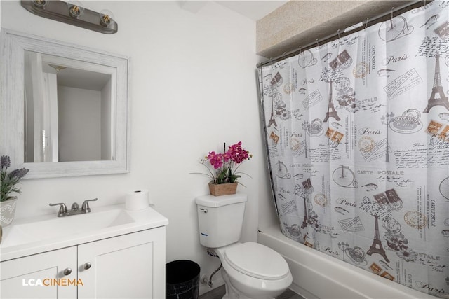 full bathroom featuring vanity, shower / bath combination with curtain, and toilet