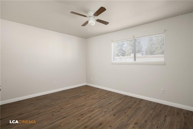 unfurnished room featuring ceiling fan and dark hardwood / wood-style flooring