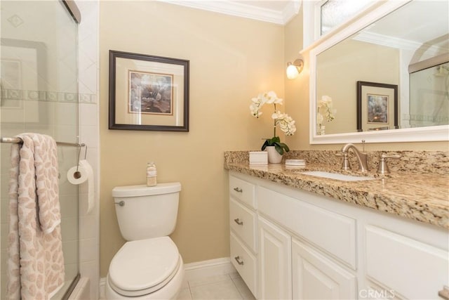 bathroom with ornamental molding, vanity, walk in shower, toilet, and tile patterned floors