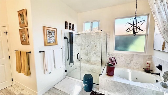 bathroom with wood-type flooring and plus walk in shower