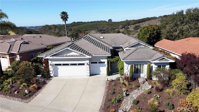 view of front of property with a garage