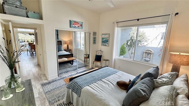 bedroom featuring a closet and light hardwood / wood-style flooring