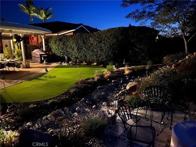 view of yard with a mountain view and a patio area