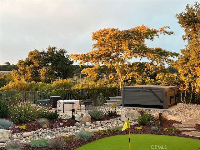 view of yard featuring a hot tub