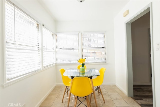 dining room featuring light tile patterned flooring