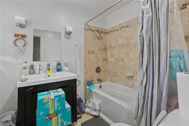 full bathroom featuring vanity, tile patterned floors, toilet, and shower / bath combo